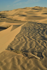 Scenic view of desert against sky