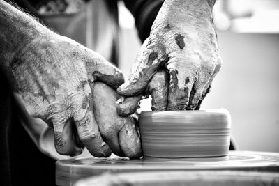 Close-up of hand holding sculpture