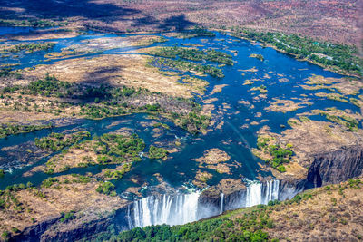 Superbe aerial view of the victoria falls with lower water between zimbabwe and zambia