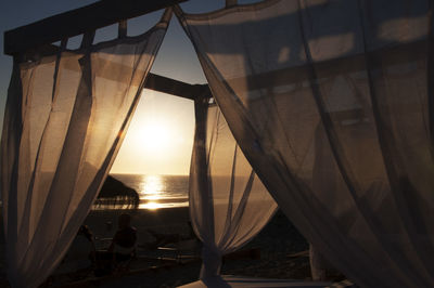 Scenic view of sea at sunset