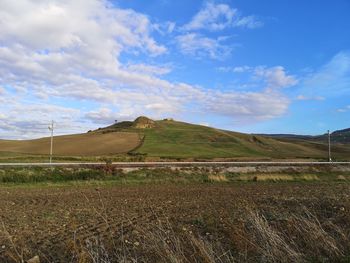 Scenic view of field against sky