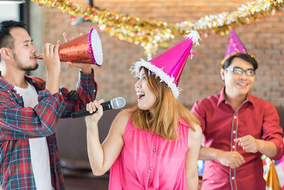 People enjoying during christmas party