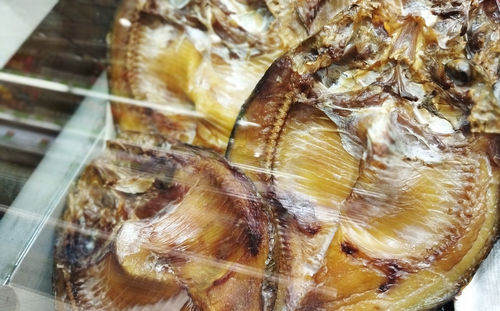 High angle view of fish in ice for sale