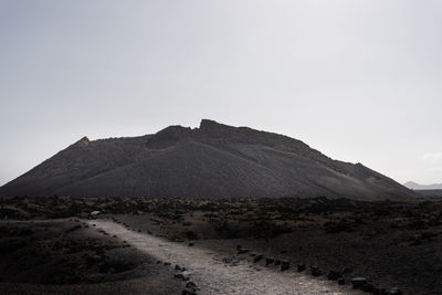Scenic view of mountains against clear sky