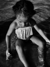 High angle view of a girl playing with water 