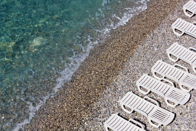 High angle view of pebbles on beach