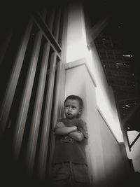 Portrait of girl standing at home