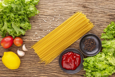 High angle view of fruits and vegetables on cutting board