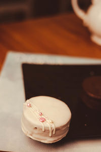 Close-up of wedding rings on table