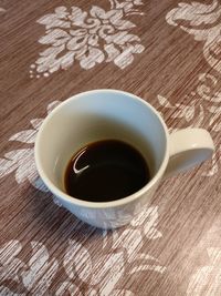 High angle view of tea cup on table