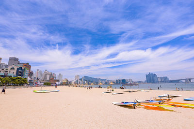 View of beach against cloudy sky