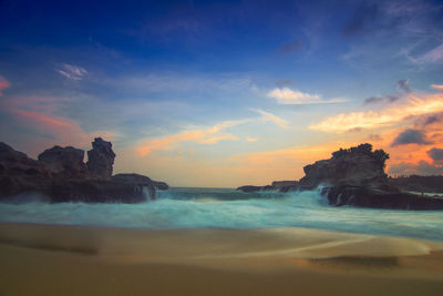 Scenic view of sea against sky during sunset