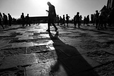 People at town square against sky