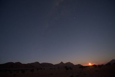 Scenic view of star field against sky at night