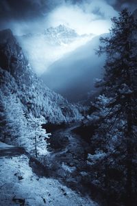 Scenic view of mountains against sky during winter