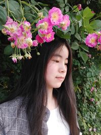 Close-up of young woman looking away