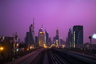 Illuminated buildings in city