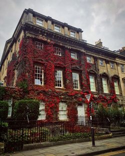 Low angle view of red building against sky