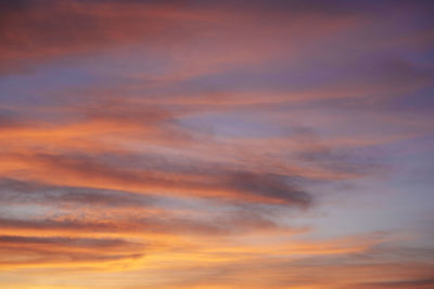 Low angle view of orange cloudy sky