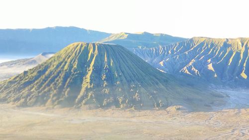 Panoramic view of snowcapped mountains against sky