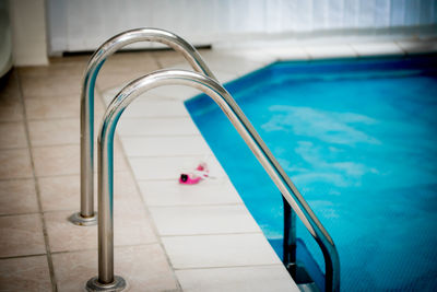 Close-up of railing at swimming pool