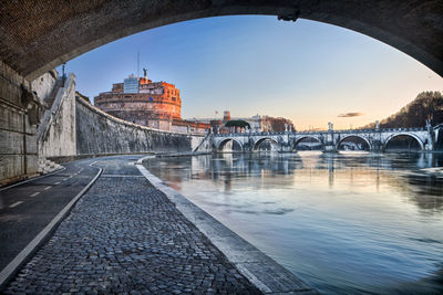 Bridge over river against sky