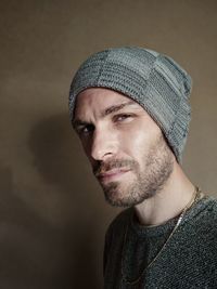 Portrait of man wearing knit hat