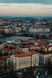 High angle view of illuminated buildings in city