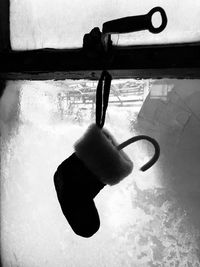 Close-up of hand holding black coffee