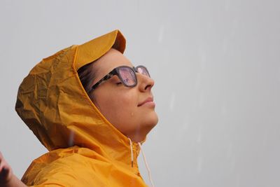 Close-up of woman wearing eyeglasses during rainy season