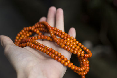 Close-up of hand holding bread