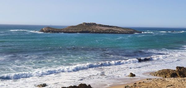 Scenic view of sea against clear sky