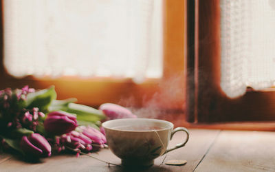 Close-up of tea cup on table