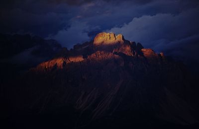 Low angle view of rock formation against sky