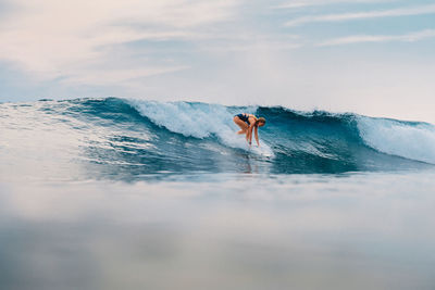 Man surfing in sea