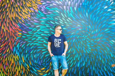 Full length portrait of man standing outdoors