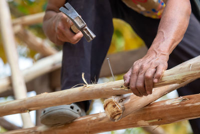 Man working on wood