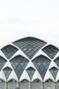 Low angle view of modern building against sky