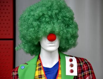 Close-up of mannequin wearing clown costume