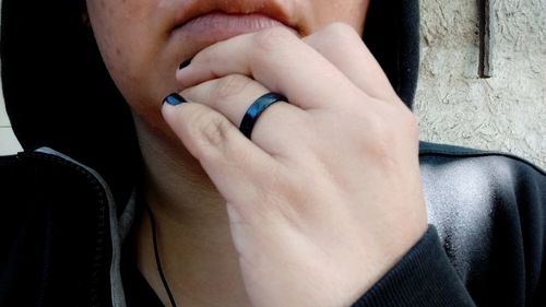 Close-up of couple holding hands