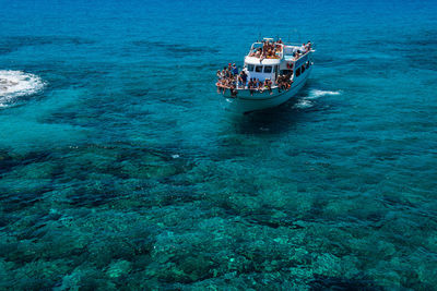 High angle view of ship sailing in sea