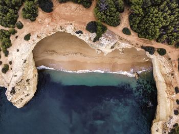 High angle view of rock formation in sea