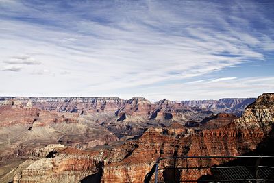View of cityscape against cloudy sky