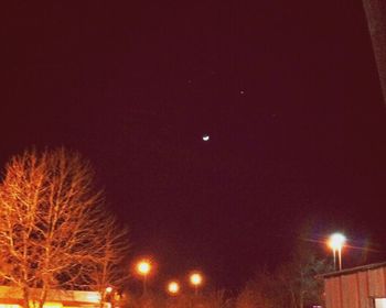 Low angle view of illuminated street light