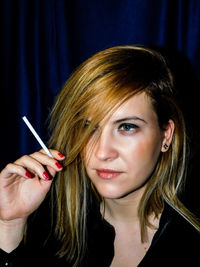 Close-up portrait of young woman
