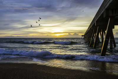 Scenic view of sea against sky during sunset