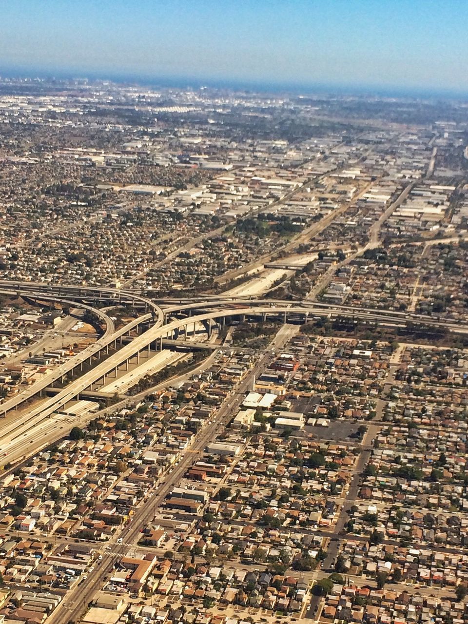 aerial view, landscape, high angle view, cityscape, railroad track, horizon over land, transportation, city, sky, scenics, rail transportation, crowded, nature, outdoors, day, built structure, no people, tranquil scene, public transportation, building exterior