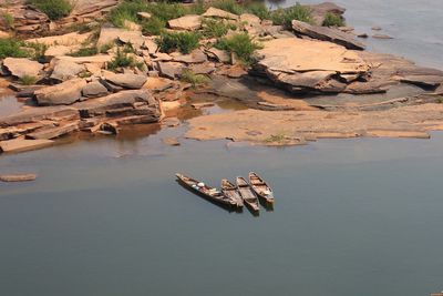 High angle view of rocks in lake