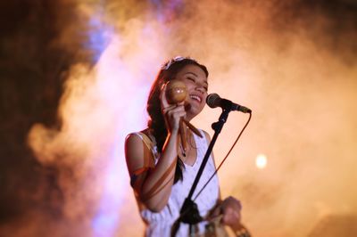 Close up of woman performing on stage