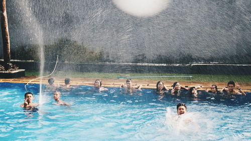 People swimming in pool